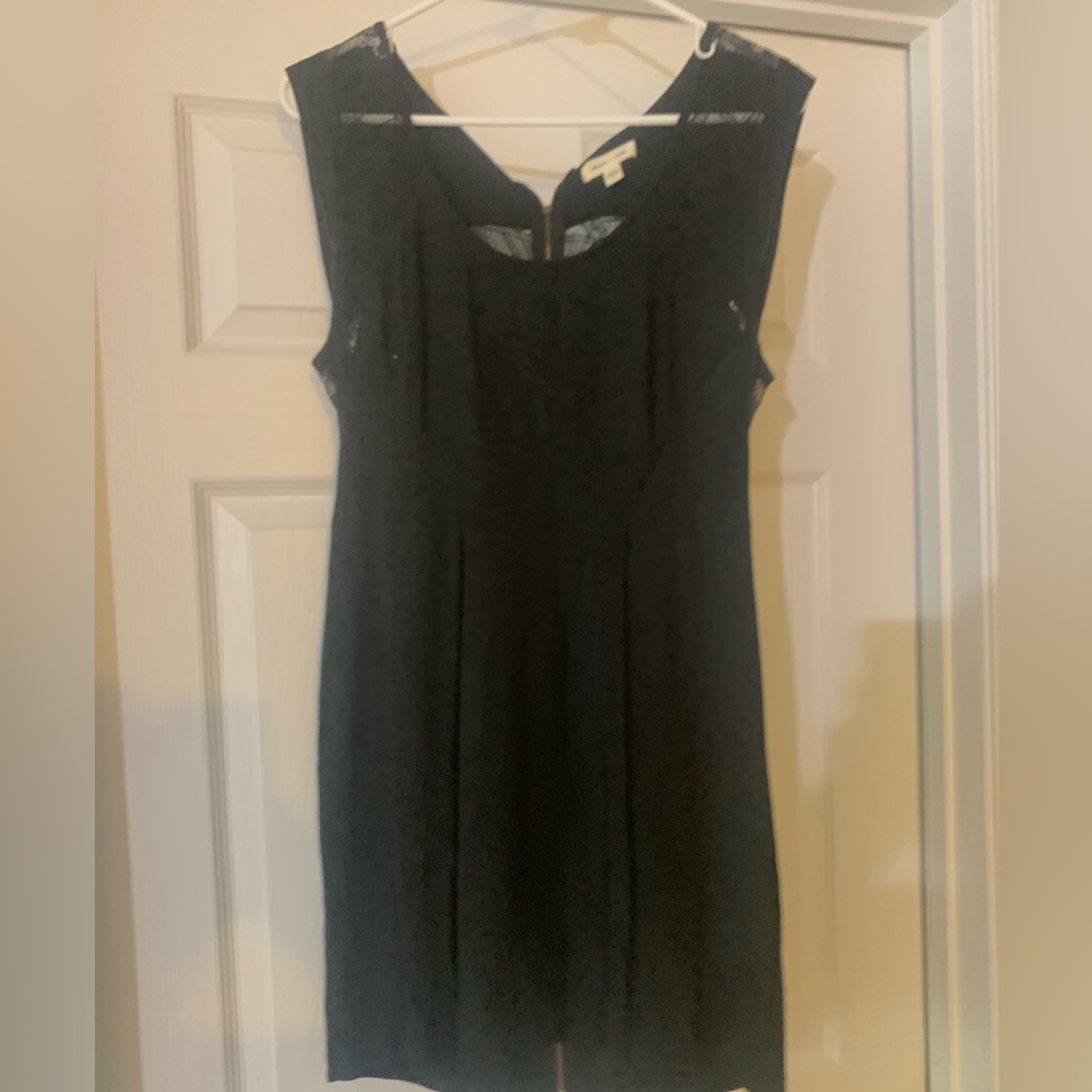 Black dress with lace and zipper down back. Size 6